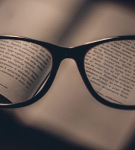 Glasses on a dictionary